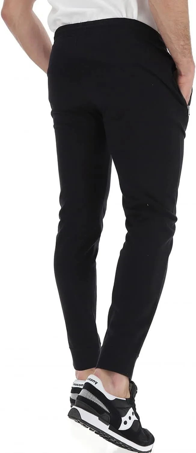 Champion Legacy men's sports trousers with zip on the pockets and cuff at the bottom 217435 KK001 black